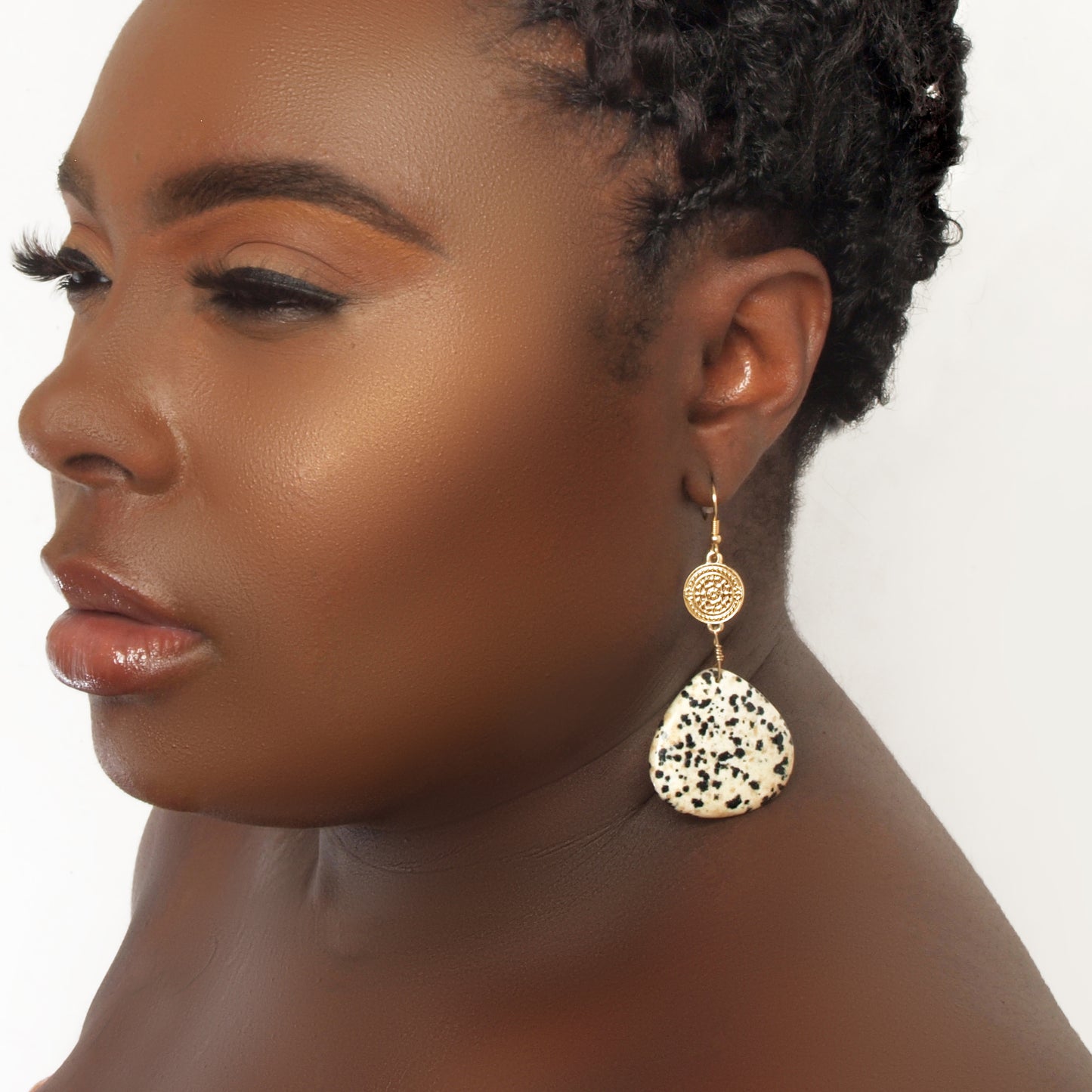 Stone dangle earrings.