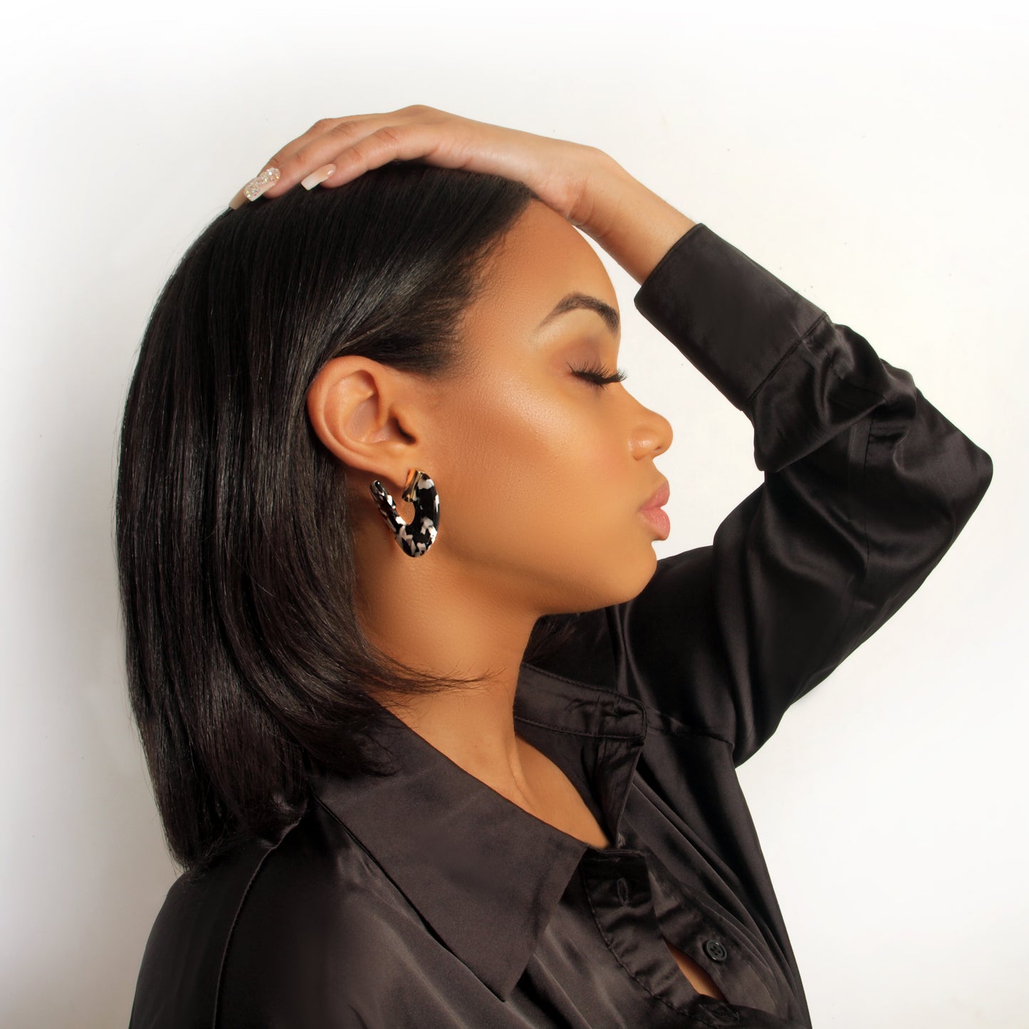 Black and white earrings.